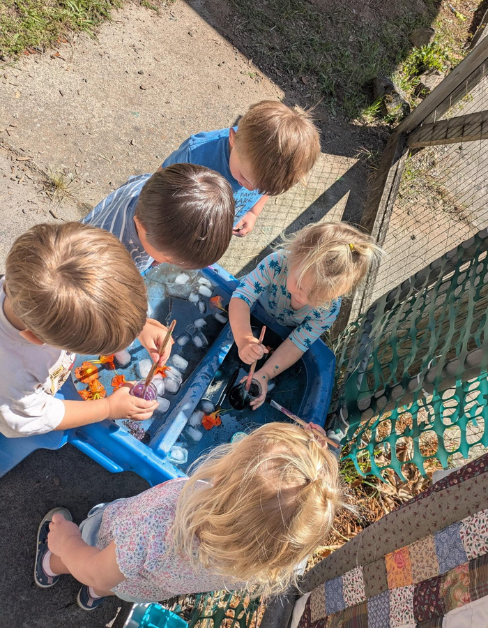 Children engaged in creative, purposeful learning activities