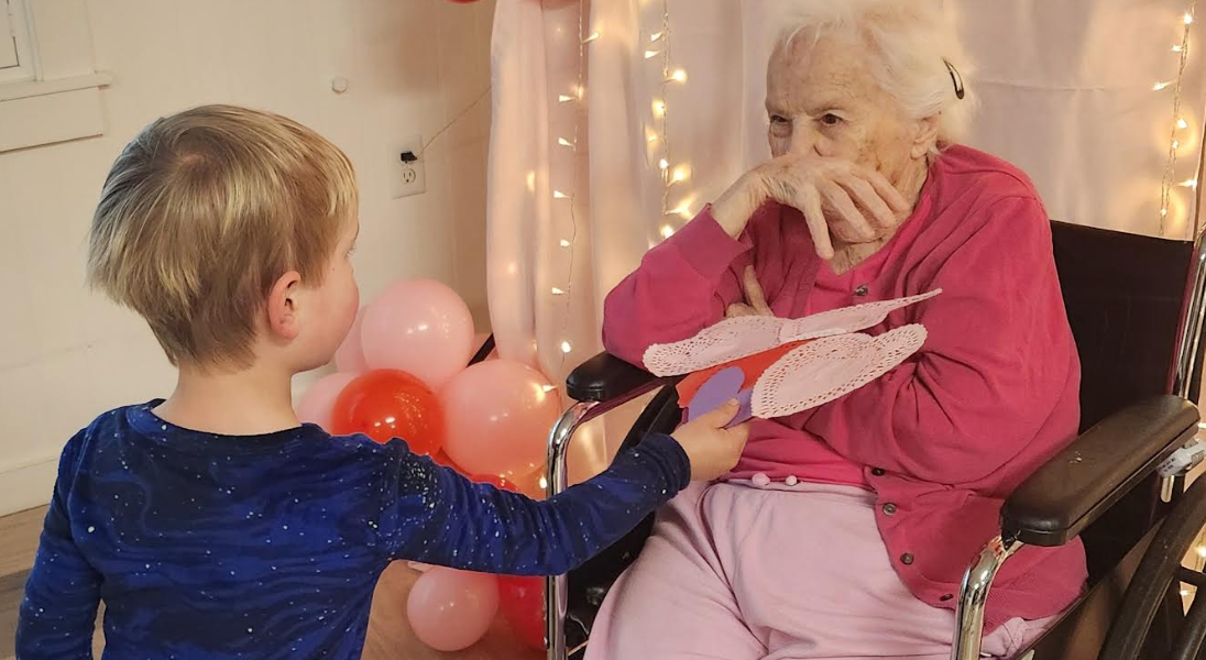 Children and community members connecting through shared experiences at You & Me